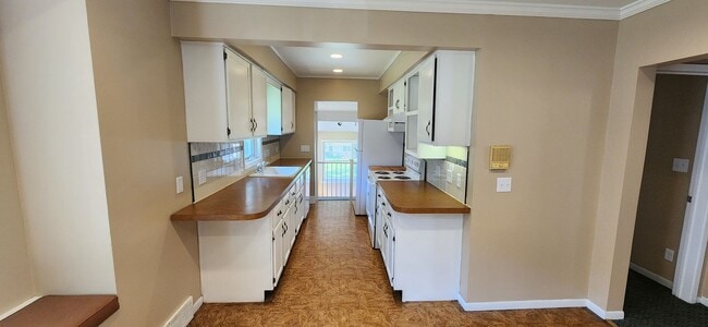 Photo - Beautiful home with attached garage and great yard!