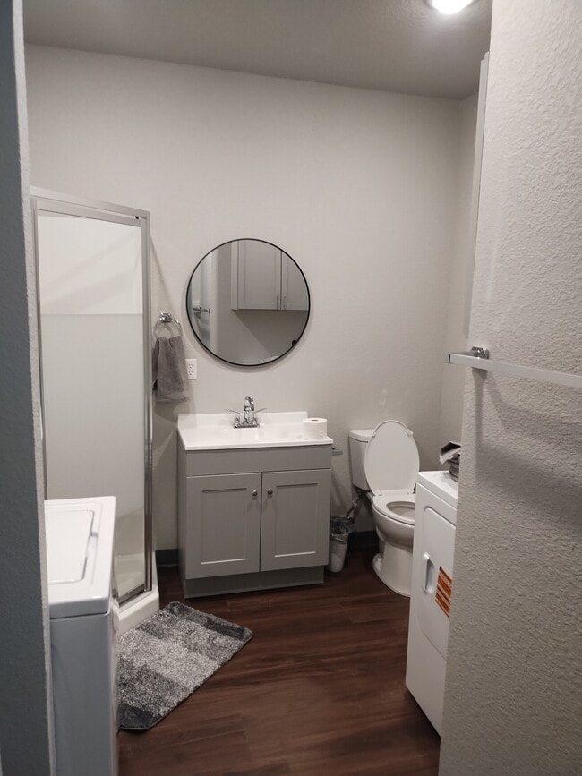 Bathroom with washer and dryer