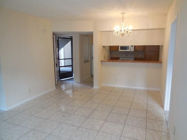 8393 Royal Palm Blvd Unit 102