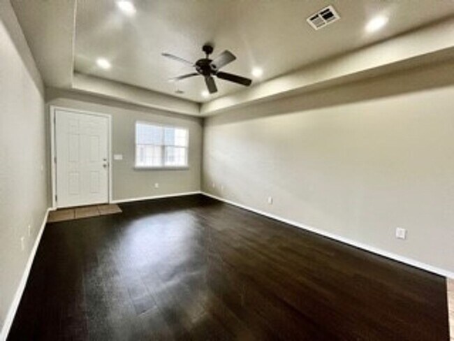 Photo - Spacious 3-Bed, 2.5-Bath Fourplex with Gar...