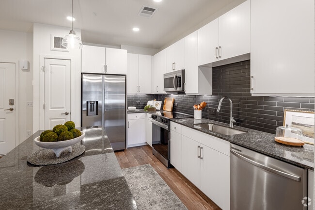 1BR,1BA-763SF-Kitchen - Alexan Pena Station