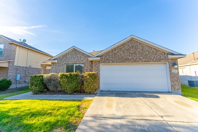 Photo - Charming Brick Home with Open Floorplan, Vaulted Ceilings, and Luxurious Amenities—Perfect for An...