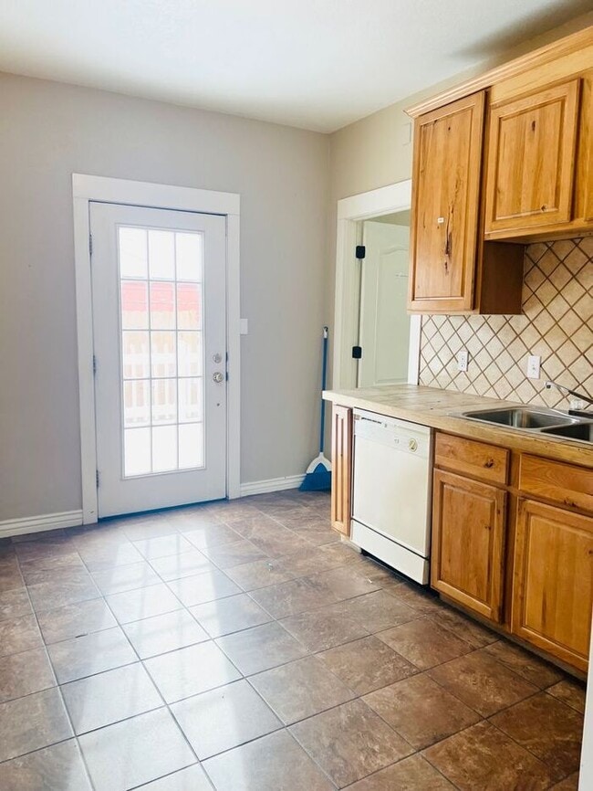 Photo - 4 bedroom, 2 Bath Duplex with 1 car detached garage Close to Downtown Greeley, CO