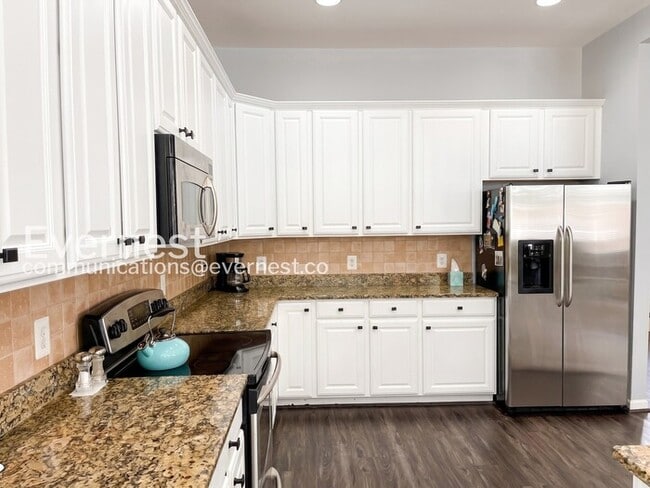 Photo - 4 Bed, 2.5 Bath Home with Garage / Pet-Friendly / Available Soon!