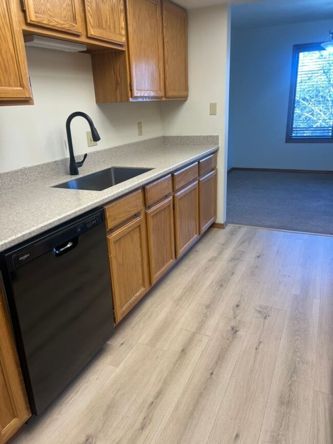 Photo - Beautiful & Spacious 2 Bed / 2 Bath Condo Near MSU – Top-Floor with Garage!