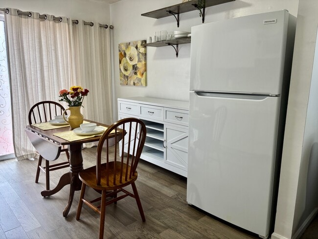 Dining area and full size fridge - 2840 Hollymead Dr Unit B