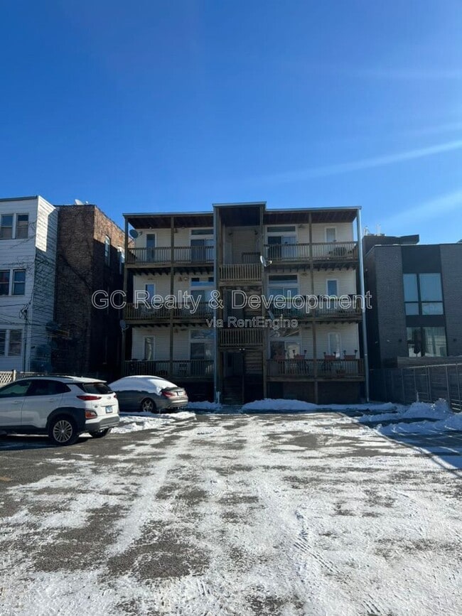Building Photo - 6130 S Greenwood Ave Unit 3