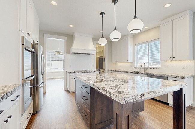 Photo - High-End Spacious 4 Bedroom Home in Desirable Highland with Private Backyard and Finished Basement