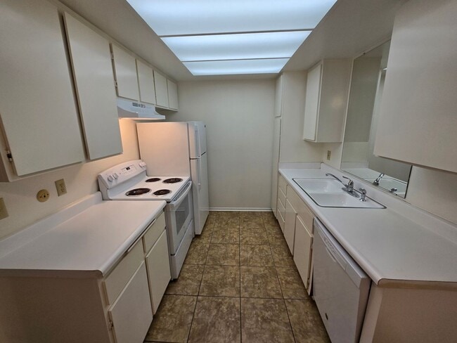 Photo - Move-In Special: 1/2 off 1st Month's Rent!!! Freshly Painted 1-Bedroom Condo with Covered Parking Unit 93