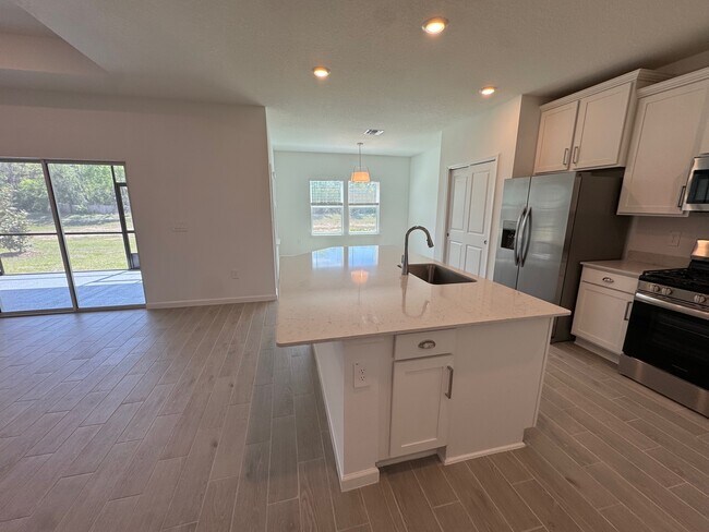 Photo - 13717 NW Convergence Blvd