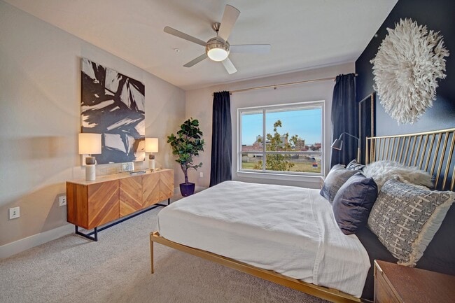 Large Bedrooms with Ceiling Fan and Plush Carpeting - Metropolitan