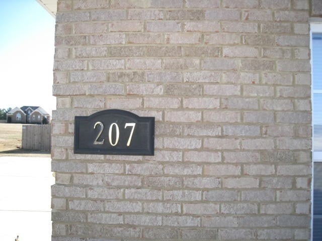 Photo - Large fenced back yard with patio