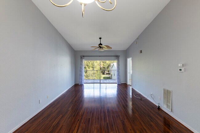 Open floor plan w/ laminate floors - 3245 Cypress Glen Way Unit 524