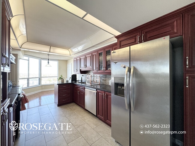 Photo - All-Inclusive 2-Bedroom + Den Corner Condo with Garage & Parking in Brampton Unit 1501