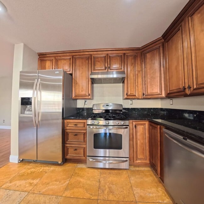 Photo - Stunning 2-Story Home with a Bedroom downstairs and a Backyard Oasis.