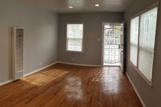 Living room w/new paint & recessed lighting - 3780 Cimarron St Apartment Unit 1