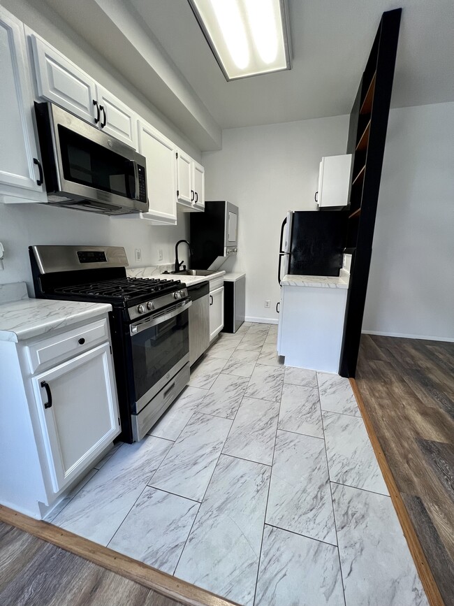 Photo - 1207 S Hanover St Unidad 2