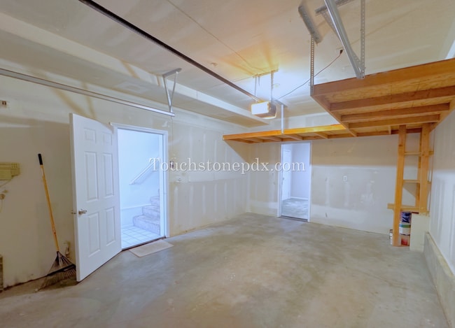 Photo - Light Filled 3 Bedroom Townhome with Deck, Attached Garage, and AC
