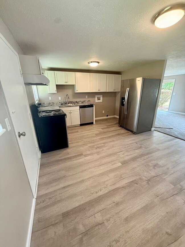 Photo - Move-In Ready 2BR in Kettering | Granite Counters + New Carpet