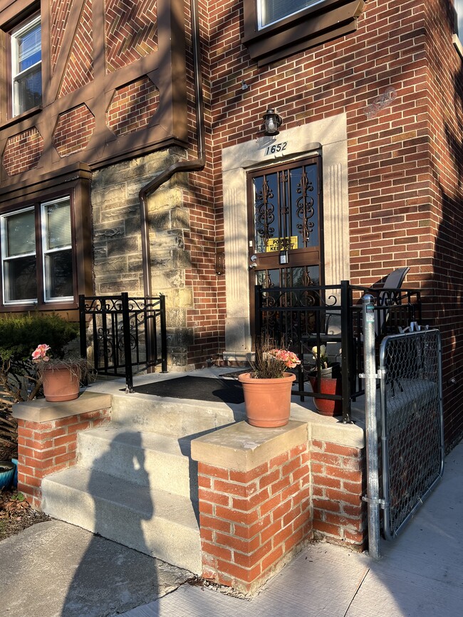 Front porch with Wong walls for sitting - 16520 Normandy St House