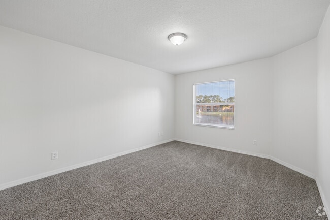 2BR, 2BA - 1,051SF - Primary Bedroom - Palm pointe