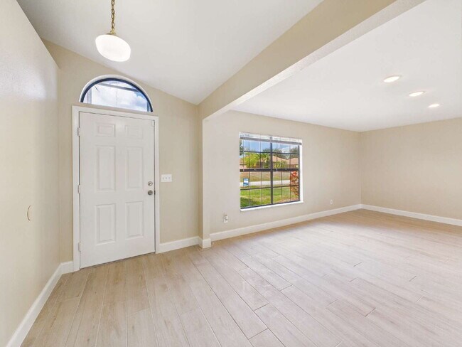 Photo - Spacious 3BR/2BA Home with Screened Lanai & 2-Car Garage