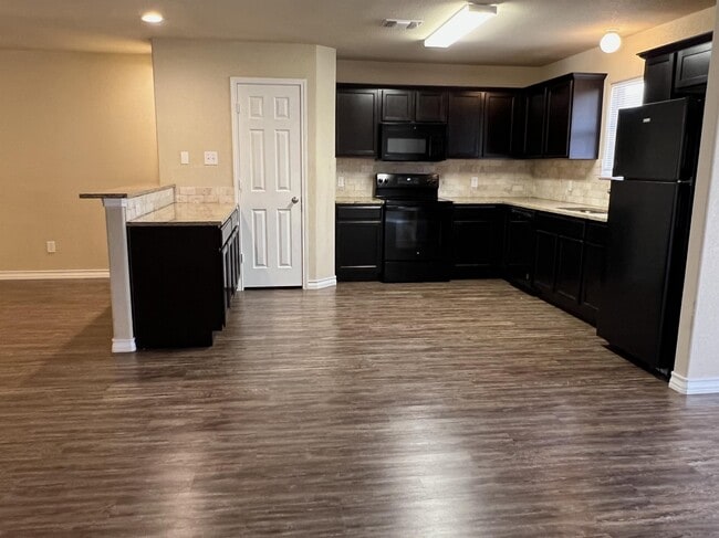 Building Photo - 4004 April Breeze Unit 101