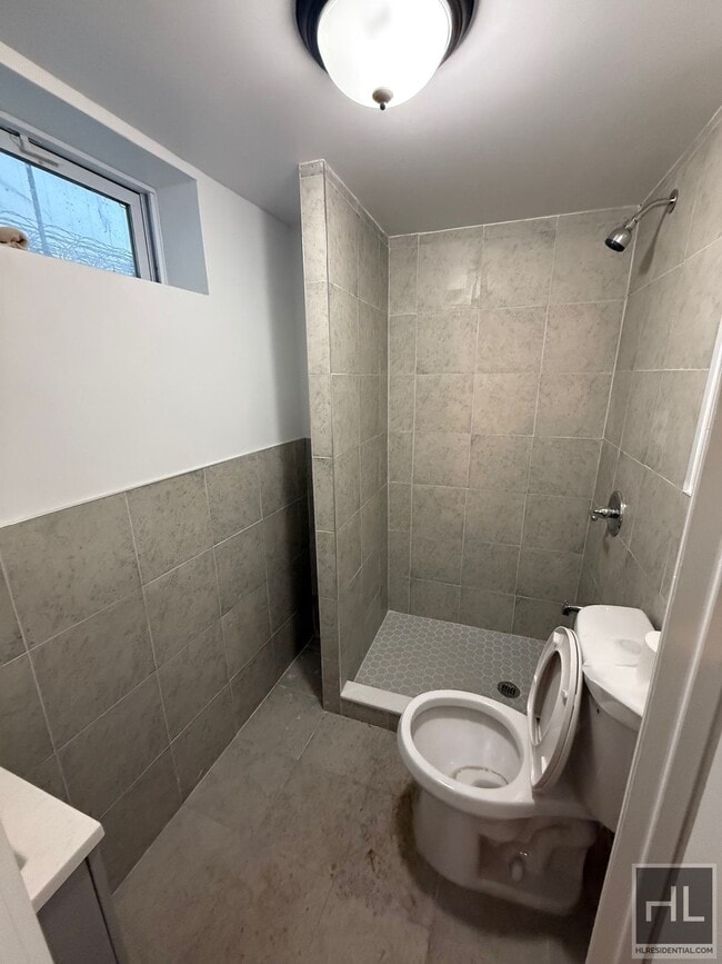 Photo - 92-49-92-75 75th St Unit 1