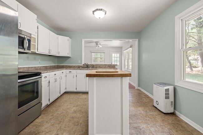 Photo - Ranch Three Bedrooms with Fenced in Yard Available April - Move in Ready!