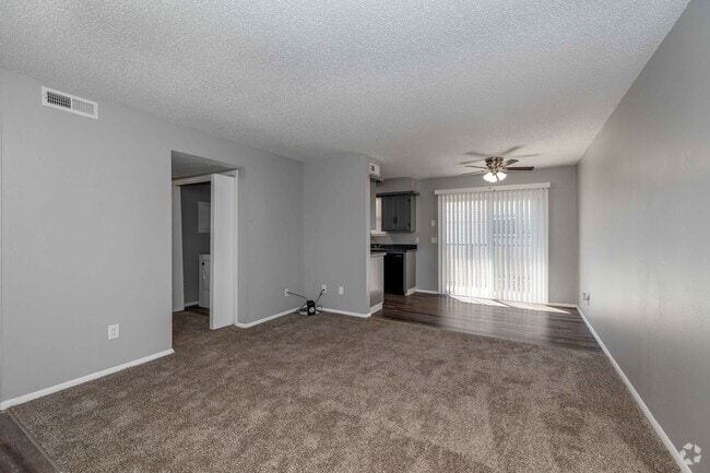 2BR, 1BA - 825SF - Living Room - Pine Creek Apartments
