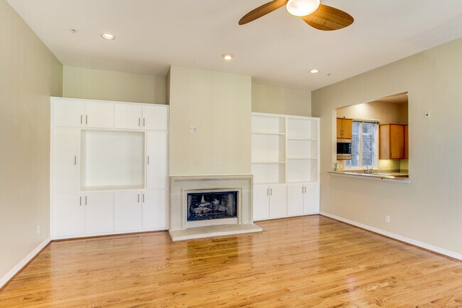 Living Room with gas Fireplace and Hardwood Floors - 3915 Cole Ave Unit 1