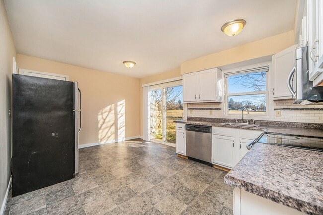 Photo - Modern 3BR Duplex – Just $1450! Security Deposit Alternative Available!