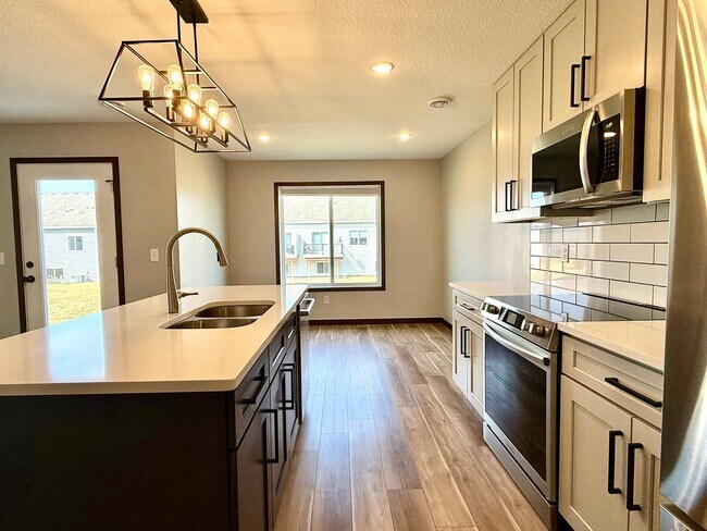 Photo - Stunning New 3BR/3BA End Unit Townhome Available Now!