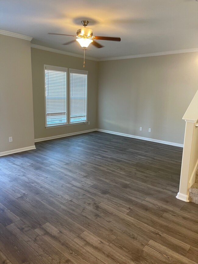 Living room from dining area and stairway - 102 Reese Way