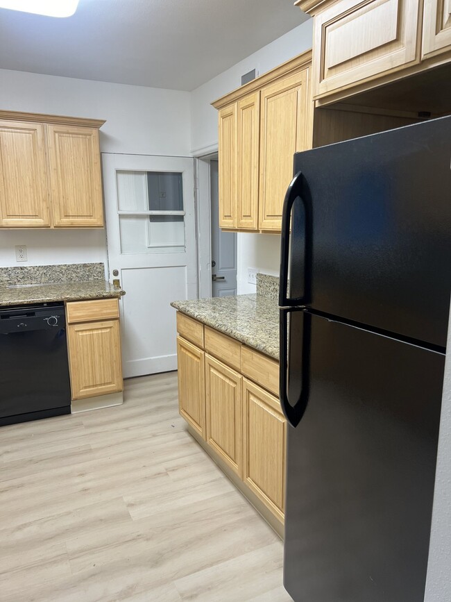 kitchen back to living room - 4662 Carman Dr