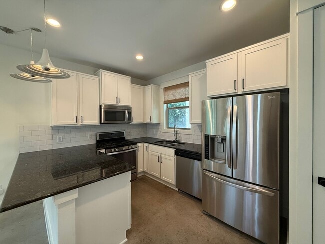 Photo - Gorgeous & modern free-standing home in ‘02!