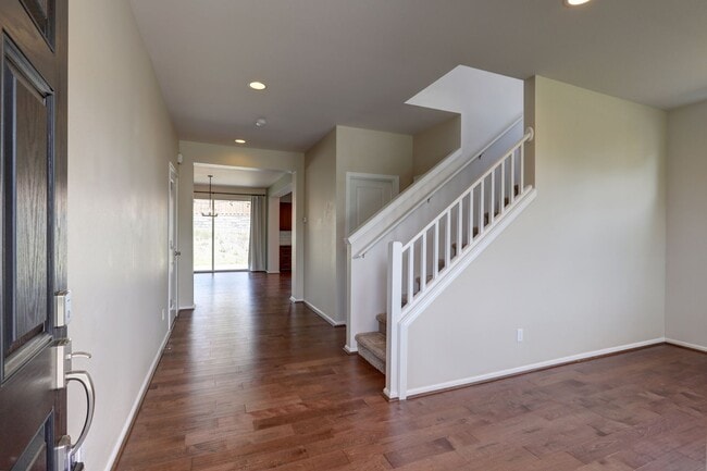Photo - 4 Bedroom Home with Open Den, Living & Family Rooms – Space for Everyone