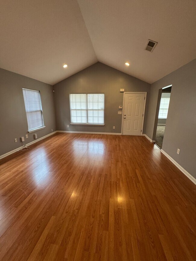 Photo - RARE 3-bedroom 2 bath single-family home offers the privacy of a house and a fully fenced in yard...