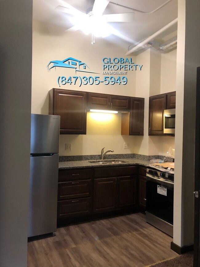 Building Photo - 6309 27th Ave Unit 1