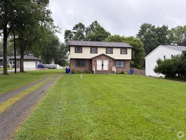 Building Photo - 1289 East and West Rd Unit Left Side Rental