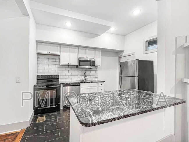 Photo - 310 W 42nd St