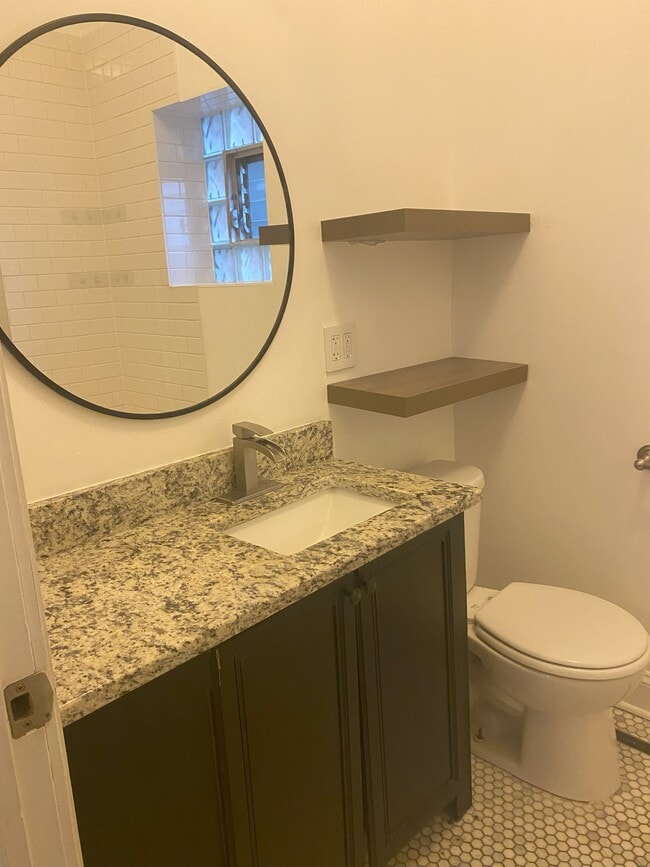 Updated bathroom - 2900 N Richmond St Unit 1R