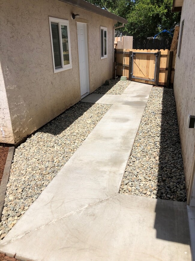 Walkway house to garage - 3710 Fairgrounds Dr