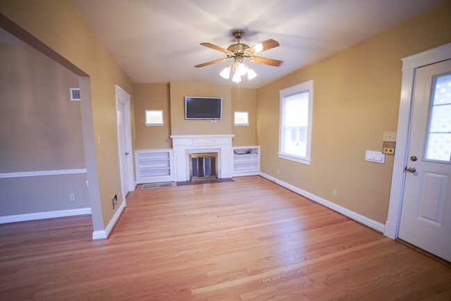 Living room is spacious with bracket & electrical outlet to mount TV (fireplace is non functional) - 1101 Yale Ave
