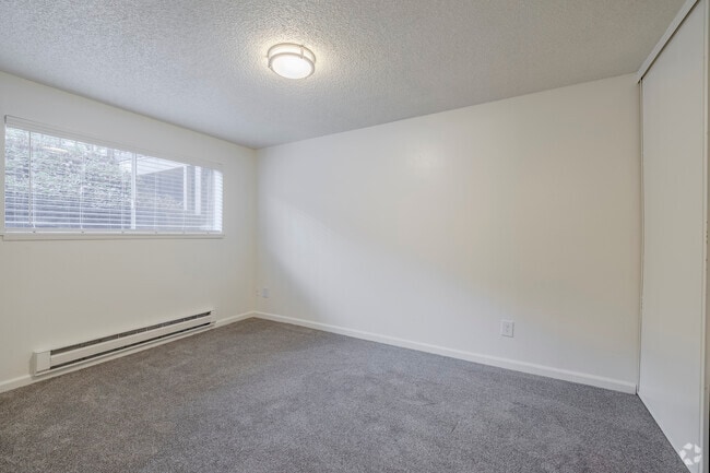 2BR, 1BR - 750SF - Primary Bedroom