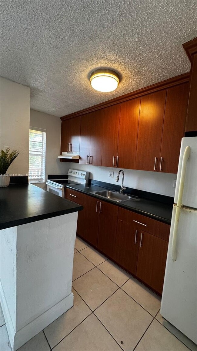 Building Photo - 4081 N Dixie Hwy Unit 20 Rental