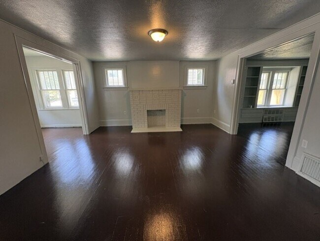 Photo - Spacious Akron Single-Family Home with Front Porch, Dining Room, Fireplace & Backyard!