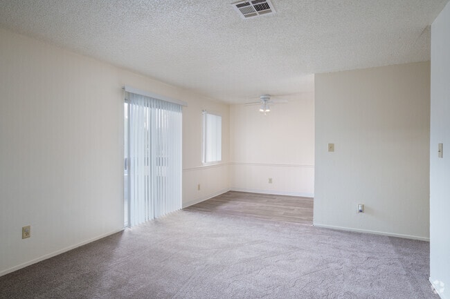 2BR, 2BA - 910SF - Living Room - Oakwood Village