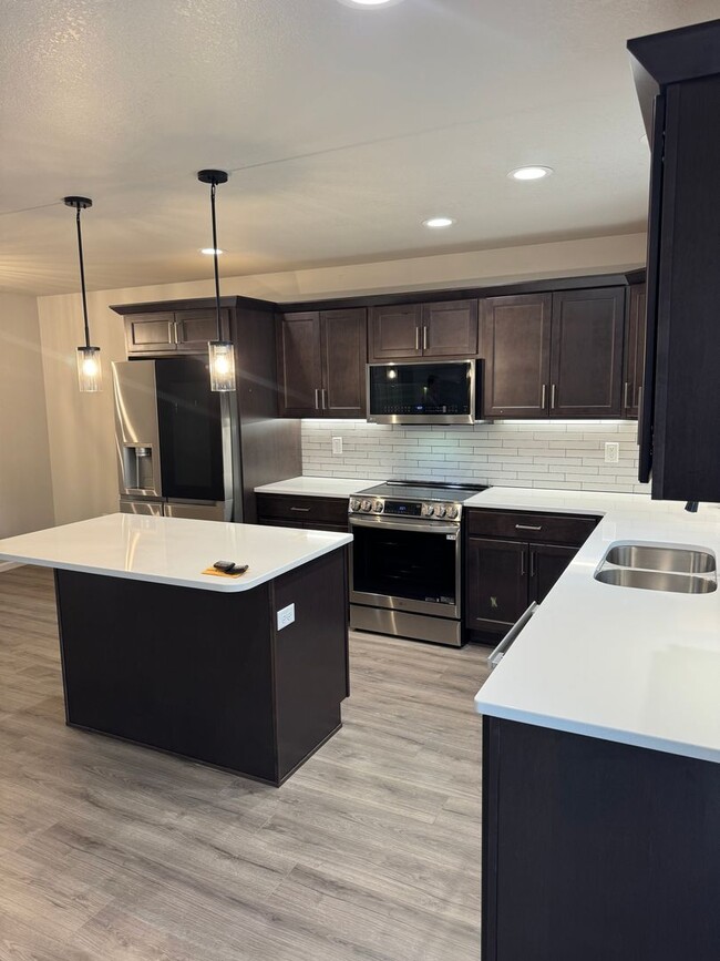 Photo - Modern 3-Bed Twinhome with Garage & Yard –...