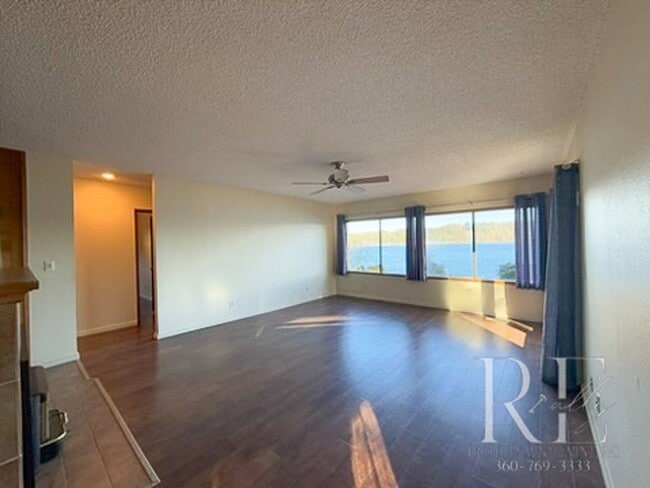 Photo - Waterfront Bliss: Stunning Puget Sound Views & Your Own Private Beach!